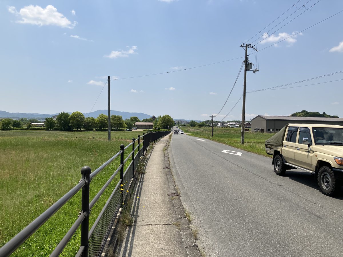 Emerging onto the main road and walking straight