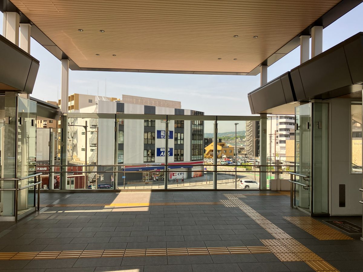 Stairs on both sides, elevator at the far left — take the elevator or left staircase